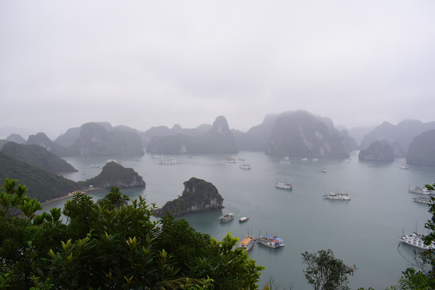 View over boats and karsts in Ha Long Bay from the top of Ti Top island