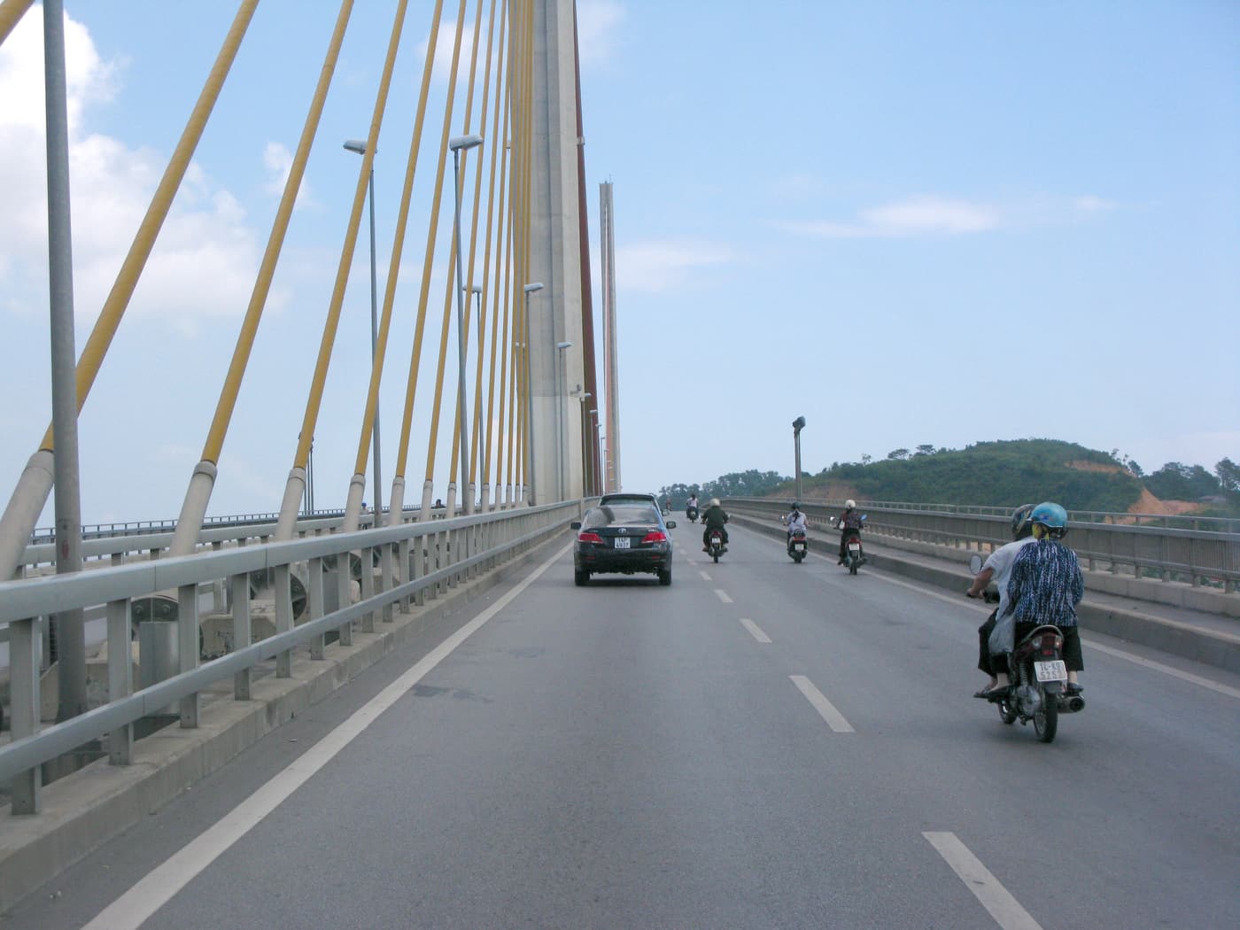 Driving across the cable-stayed Bai Chay bridge in Ha Long city